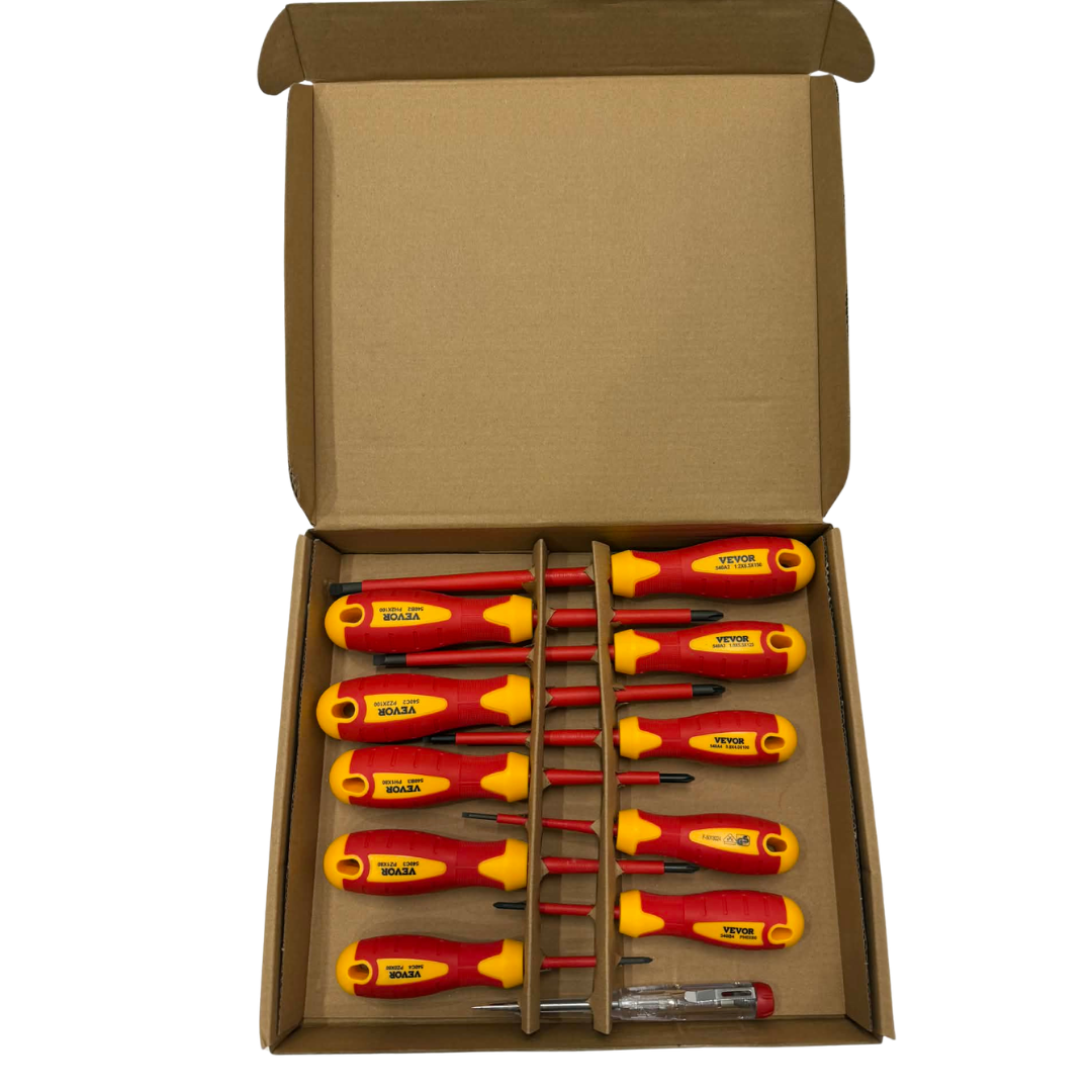 Set of insulated screwdrivers and a voltage testing pen in a cardboard box
