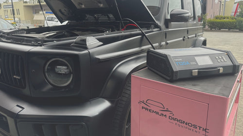 a smart battery charger connected to a modern vehicle