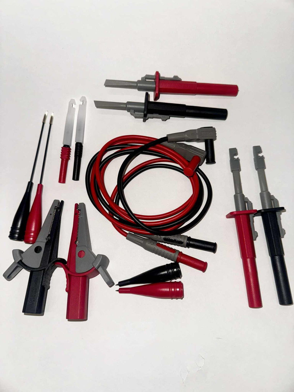 Collection of electrical test leads and probes