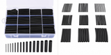 Black heat shrink tubing in a clear organizer box with additional tubing displayed