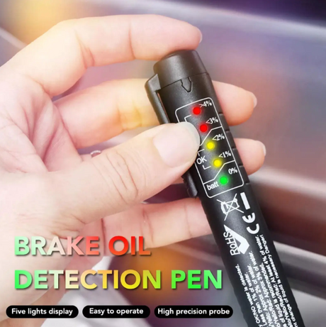 hand holding a brake oil detection pen with product details