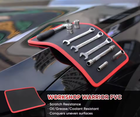 A workshop tool mat holding several silver wrenches and sockets, shown resting on a glossy black car hood. Text at the bottom reads 'WORKSHOP WARRIOR PVC' with feature bullet points.